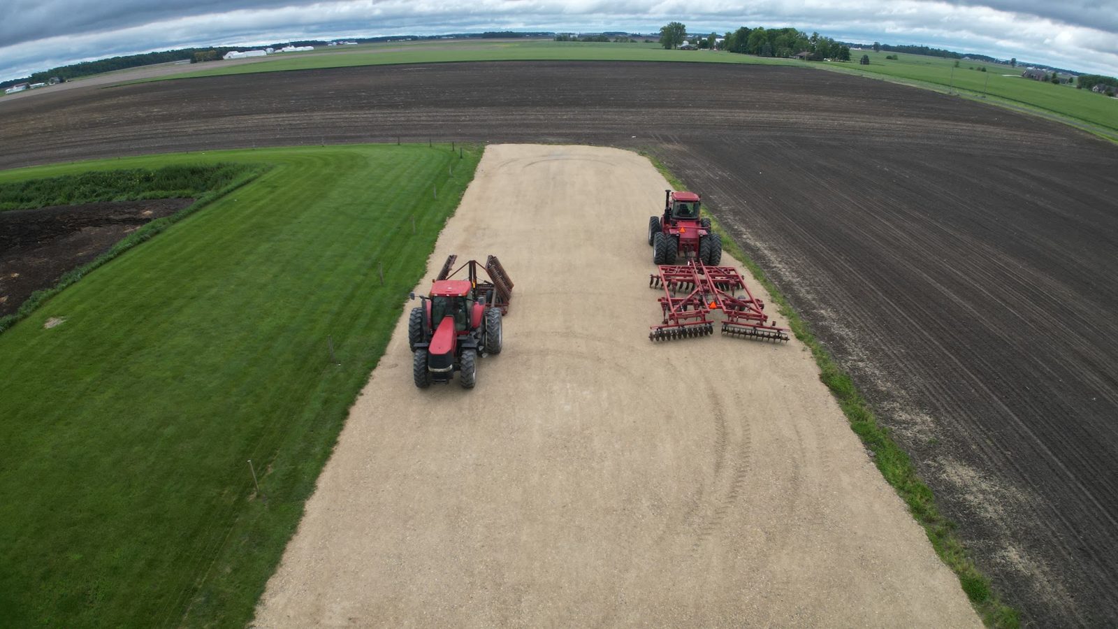 Aerial view of a finished Patterson Dirtscapes gravel pad on a farm