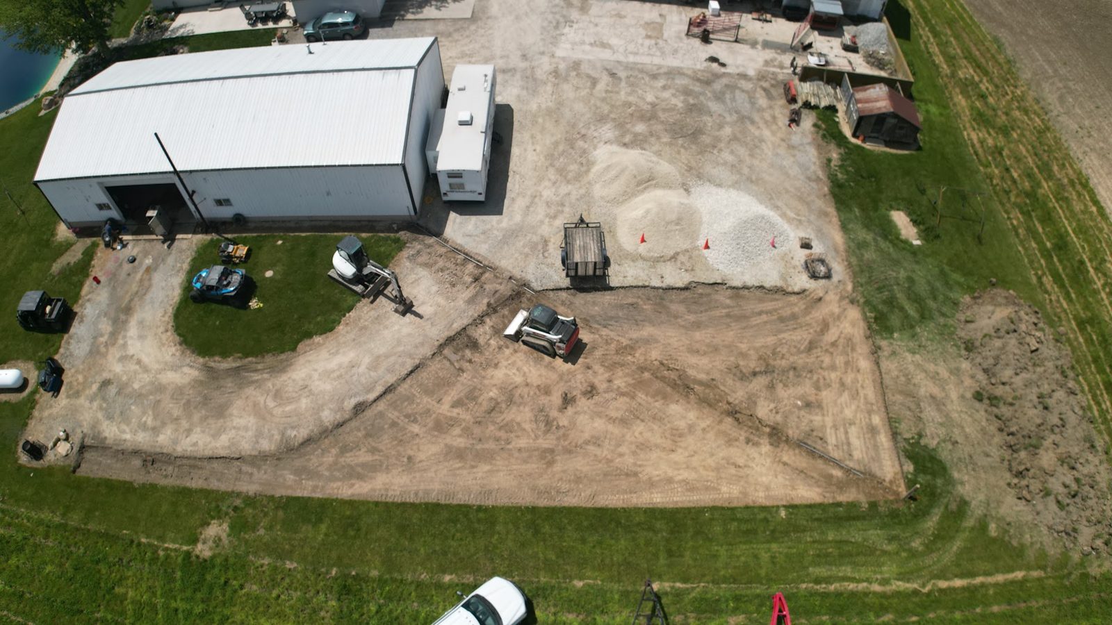 Aerial view of a Patterson Dirtscapes lot grading job with skid steer