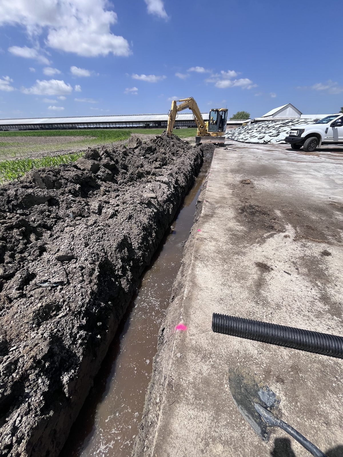 Trench and drain line work on a Patterson Dirtscapes job